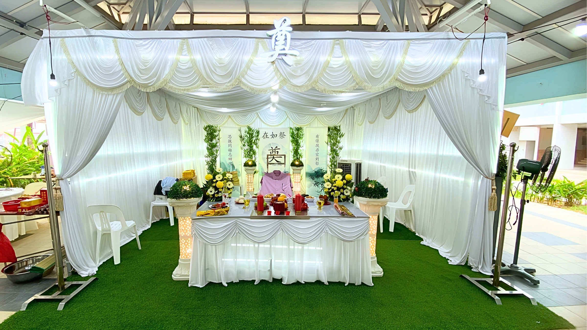 Taoist Funeral Wake Package Singapore with Taoist altar setup and flowers